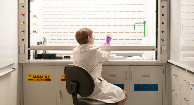 Oncology scientist working in a lab